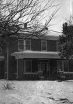 Exterior of an unidentified brick home by W. D. Smith