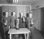 Group of men holding Silver Cups by W. D. Smith