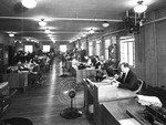 Employees working in an office by W. D. Smith