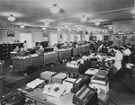 Employees working in an office by W. D. Smith