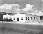 A Southwestern-style building housing the Pate-Collner and the Dudley Hodkins Company by W. D. Smith