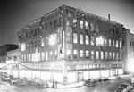 Exterior view of Washer Brothers Store Building with Christmas lights by W. D. Smith