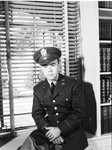 Portrait of a young man wearing a military uniform by W. D. Smith