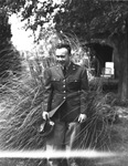 Portrait of a young man wearing a military uniform by W. D. Smith