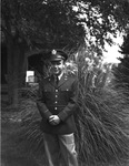 Portrait of a young man wearing a military uniform by W. D. Smith