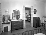 Bedroom doorway leading into the kitchen by W. D. Smith