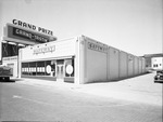 Exterior view of Safeway Store and C. C. Famous Barbecue by W. D. Smith