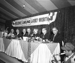 Carling Brewery groundbreaking guests seated at tables under big tent