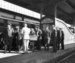 Carling Brewery officials getting ready to board train