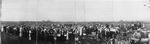 A panoramic view of large crowd of people attending picnic, Fort Worth, Texas by Bryant Studio