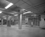 Open floor space with machines in background