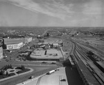 Monnig's Department Store, Bowen Bus Terminal, and Well Machinery & Supply by W. D. Smith Commercial Photography