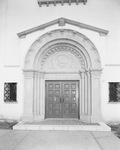 The exterior of a church doorway by W. D. Smith