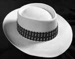 Straw hat with polka-dot ribbon by W. D. Smith