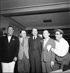 A group of men in 1920s costumes by W. D. Smith