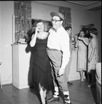 A couple wearing 1920s costumes by W. D. Smith