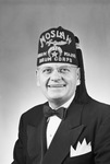 Portrait of Art Ford wearing a Moslah drum corps fez by W. D. Smith