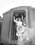 Moslah Shriners waving from a train car by W. D. Smith