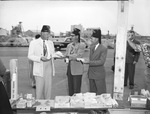 Shriners handing out food by W. D. Smith