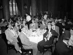 Shriners and a group in a dining room by W. D. Smith