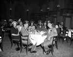 Shriners and a group in a dining room by W. D. Smith