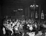 Shriners and a group in a dining room by W. D. Smith