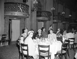 Shriners and a group in a dining room by W. D. Smith