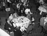 Shriners and a group in a dining room by W. D. Smith