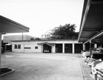 Garage at the back of the Frontier Pontiac Inc. dealership by W. D. Smith