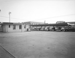 Back of the showroom of the Frontier Pontiac Inc. dealership by W. D. Smith