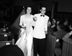 Newly married couple walking down the aisle by W. D. Smith