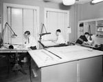 Three men working on drafting tables in an architect's office by W. D. Smith