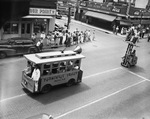 Moslah Tooniville Trolley in a parade by W. D. Smith