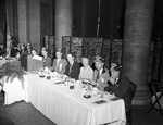 Shriners sitting at a speakers' table by W. D. Smith