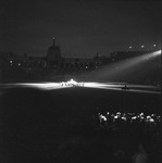 Night view of the Moslah band playing in the Los Angeles Memorial Coliseim by W. D. Smith