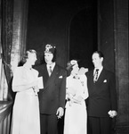 Two couples posing by W. D. Smith