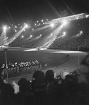 A night view a Shriners parade at the Los Angeles Colliseum by W. D. Smith