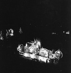 A night view a Shriners parade at the Los Angeles Colliseum by W. D. Smith