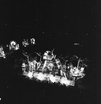 A night view a Shriners parade at the Los Angeles Colliseum by W. D. Smith