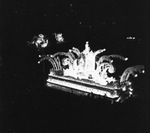 A night view a Shriners parade at the Los Angeles Colliseum by W. D. Smith