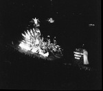 A night view a Shriners parade at the Los Angeles Colliseum by W. D. Smith