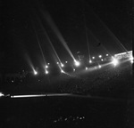 A night view a Shriners parade at the Los Angeles Colliseum by W. D. Smith