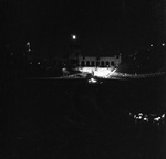 A night view a Shriners parade at the Los Angeles Colliseum by W. D. Smith