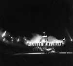 A night view a Shriners parade at the Los Angeles Colliseum by W. D. Smith