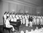 Arabia Temple Chanters in choral formation on stage by W. D. Smith