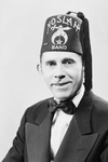 Portrait of Frank Rainwater wearing a Moslah band fez by W. D. Smith