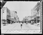 Boy on bicycle in downtown Fort Worth by W. D. Smith