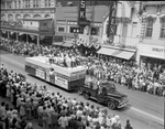 Moslah Shrine band chuck wagon float in parade by W. D. Smith