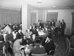 Group in dining room by W. D. Smith