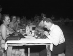 Group at picnic table by W. D. Smith